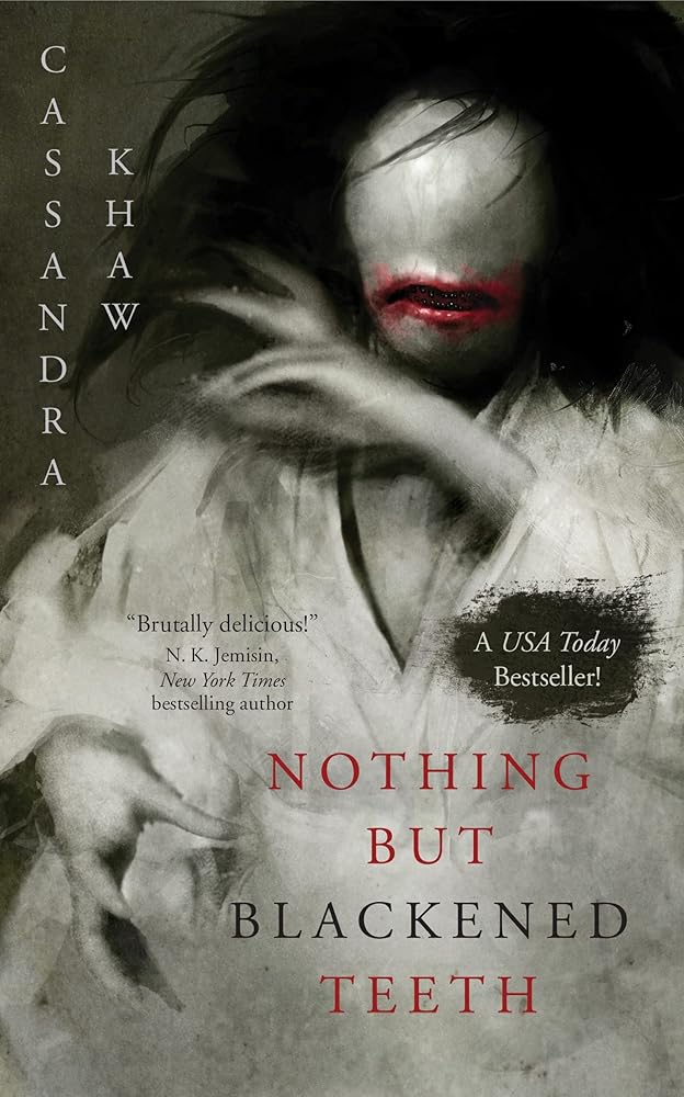 Nothing But Blackened Teeth cover image